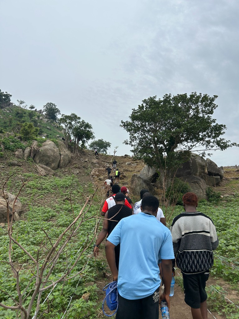G:Lite Hub community hiking expedition ascending the scenic mountain trail in Dutse